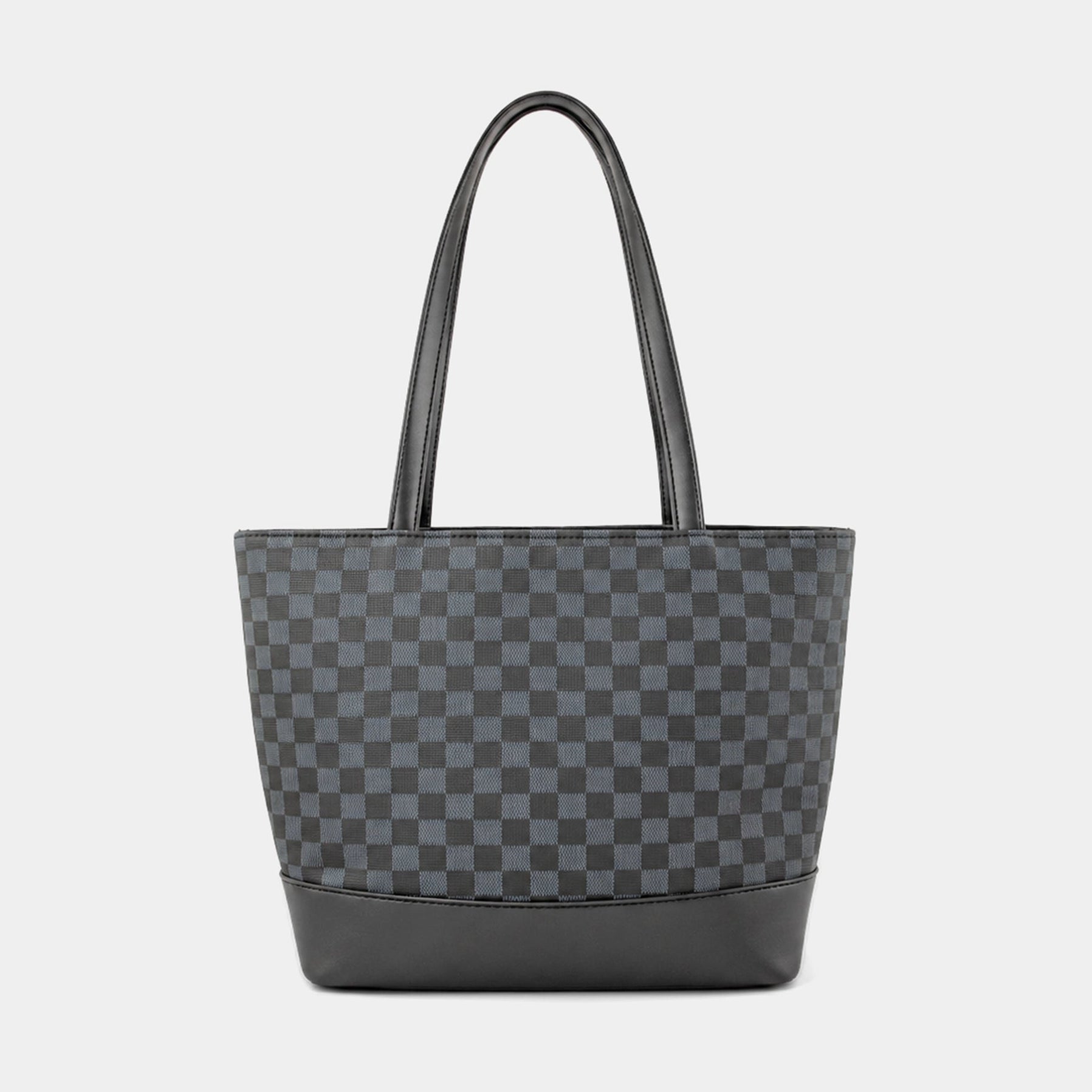 A dark gray and black checkerboard patterned tote bag with black leather handles and a black base, shown against a light gray background.