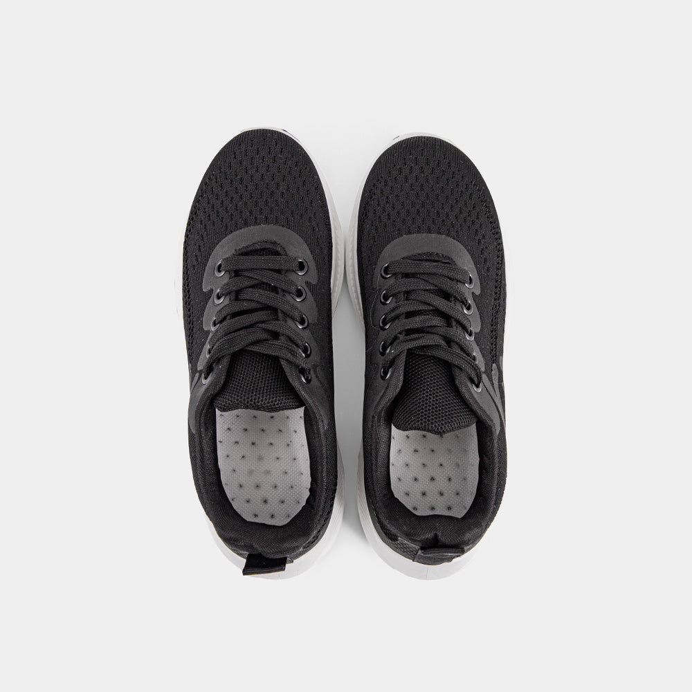 Black Lemis sneakers with a white sole, featuring a breathable upper and cushioned support, perfect for casual wear and light workouts