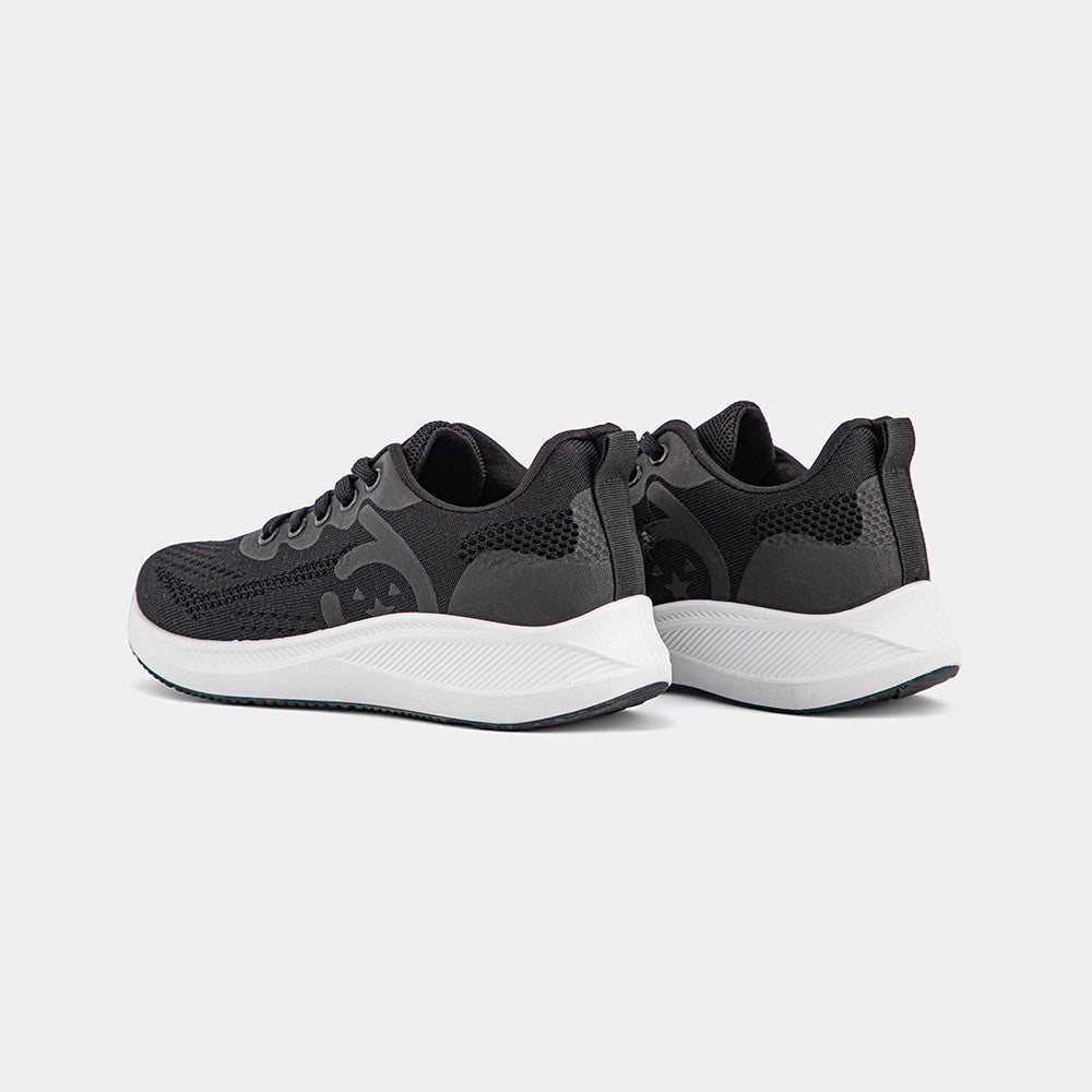 Black Lemis sneakers with a white sole, featuring a breathable upper and cushioned support, perfect for casual wear and light workouts