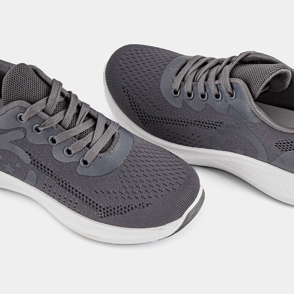 Grey Lemis sneakers featuring a breathable knitted upper with a cushioned white sole, designed for comfort and casual wear, suitable for various occasions